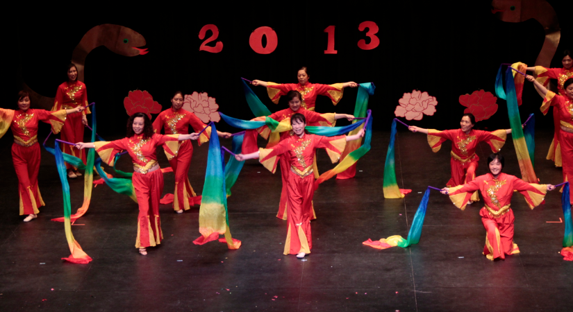 Mothers dancing the traditional Ribbon Dance
